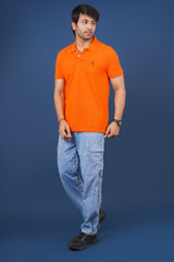 Men's orange core pique polo t-shirt with embroidered logo