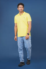 Men's yellow core pique polo t-shirt with embroidered logo