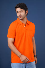 Men's orange core pique polo t-shirt with pocket